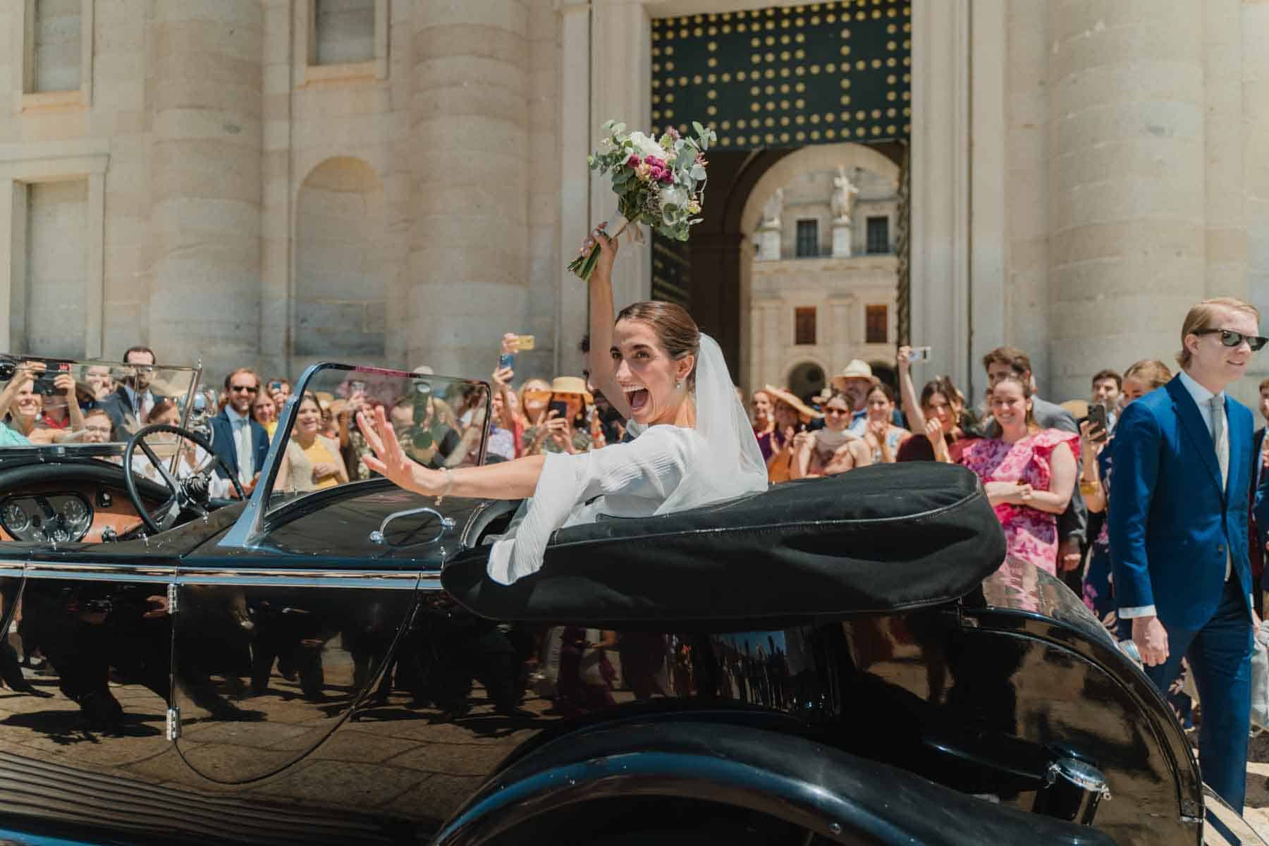 Guests cheering the newlyweds