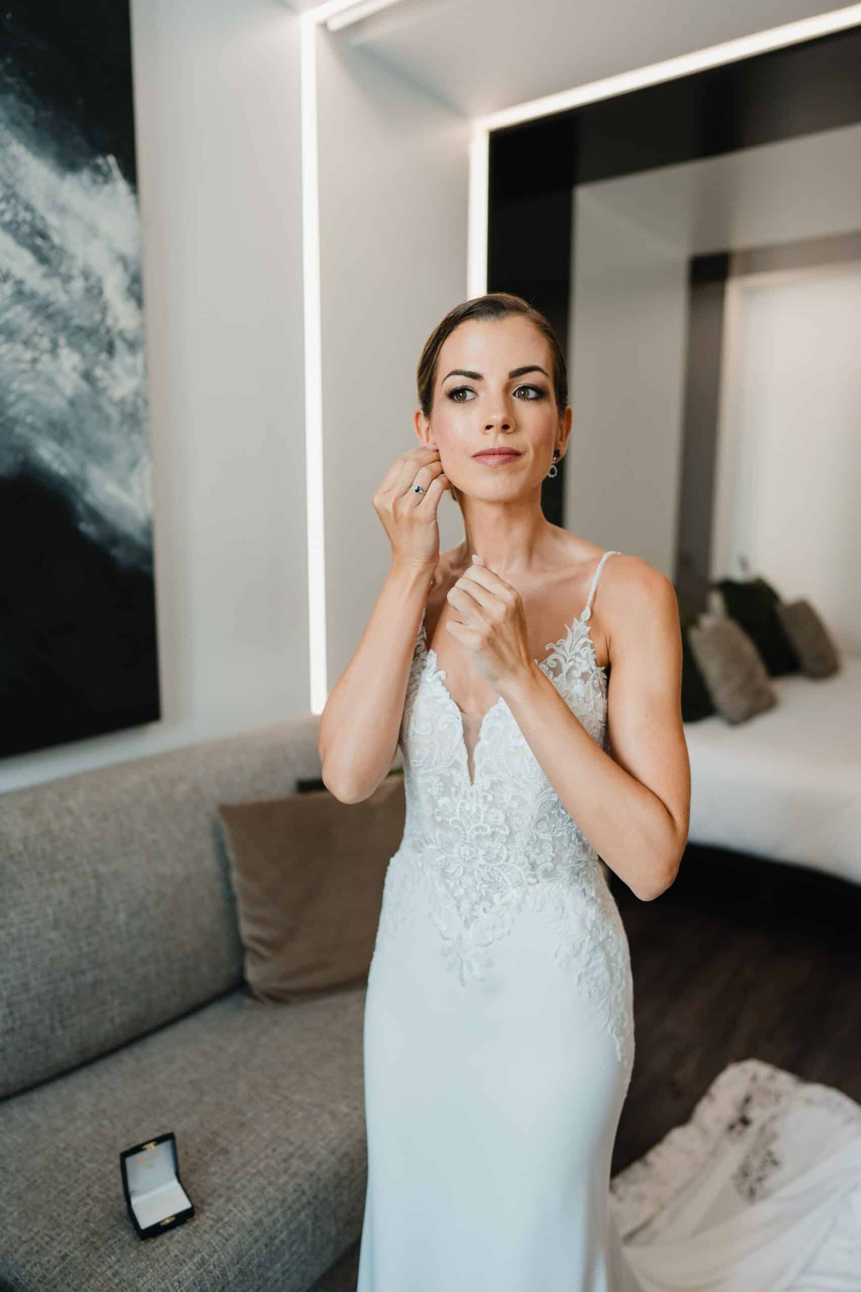 Bride Adjusting Dress
