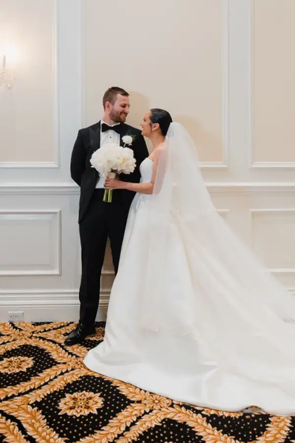 Bride and groom posing after their wedding ceremony at Trump National Doral Miami