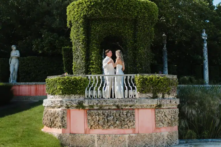 Gabby and Mike together on a garden terrace at Vizcaya