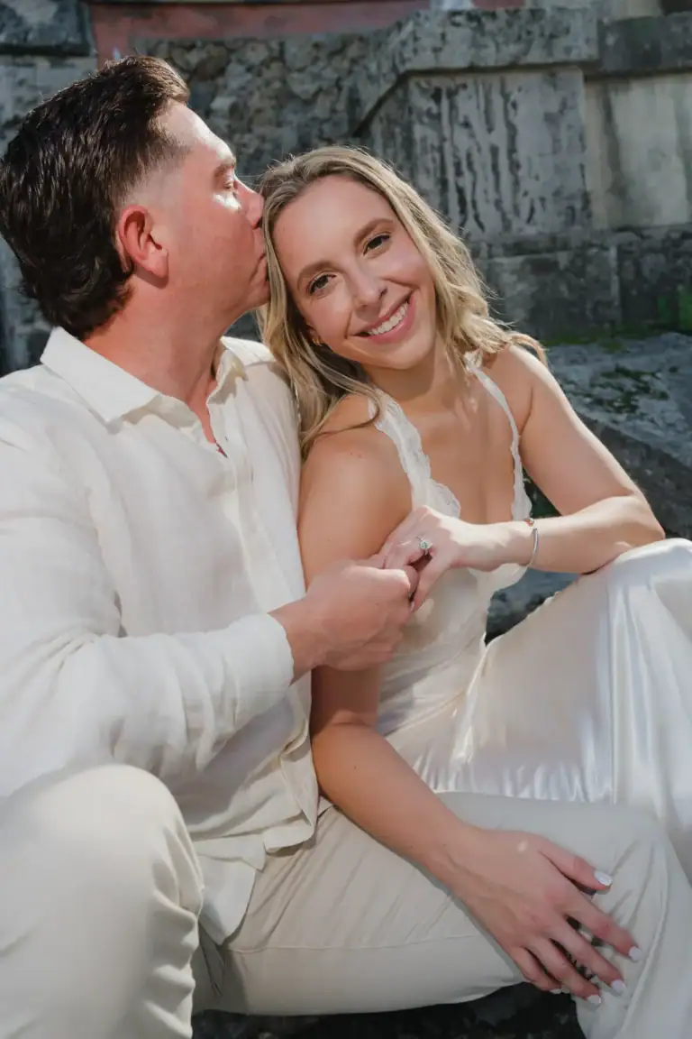 Close portrait of Gabby and Mike together on stone steps