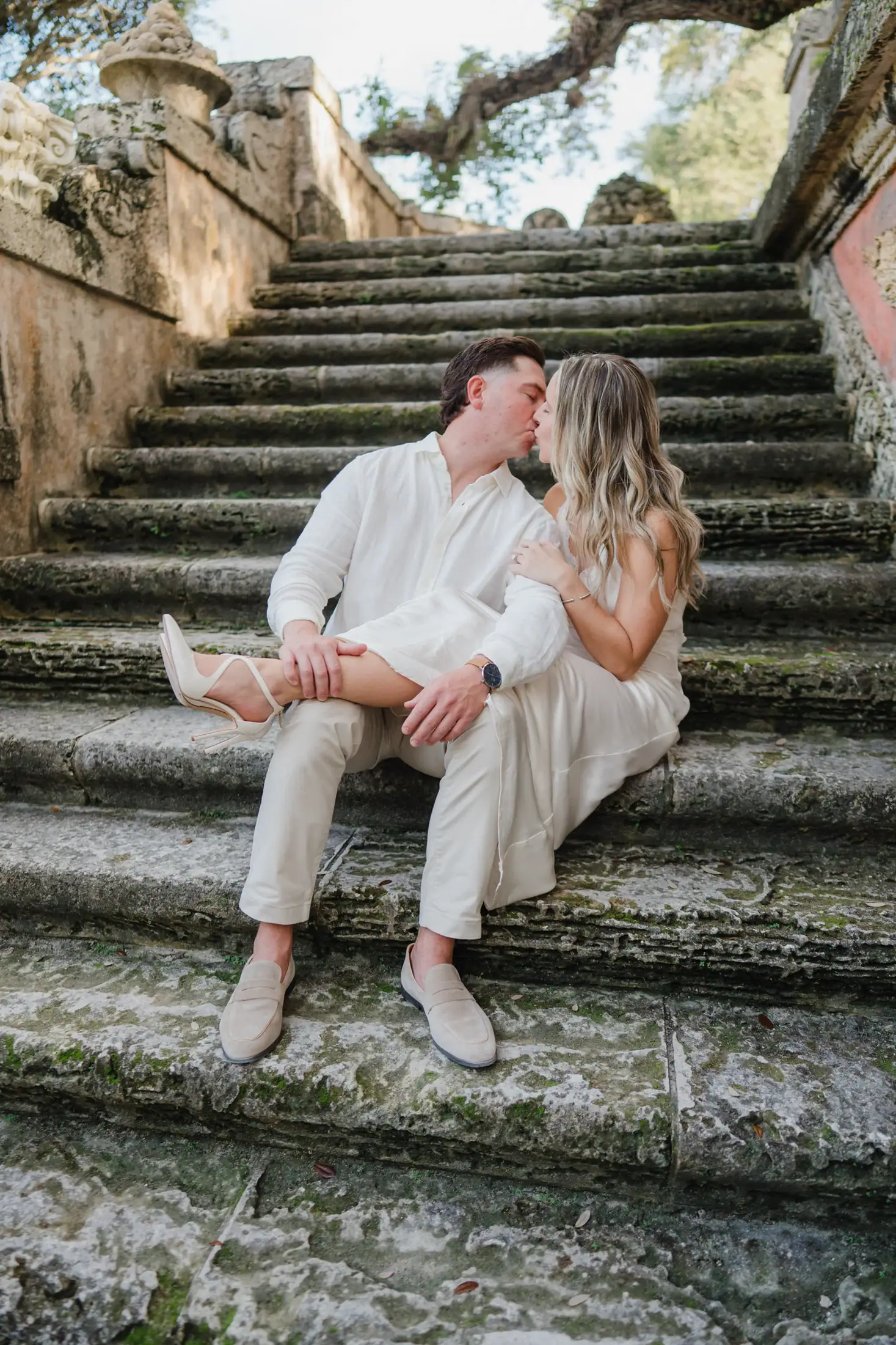 Groom portrait on a stone staircase during the Vizcaya engagement session