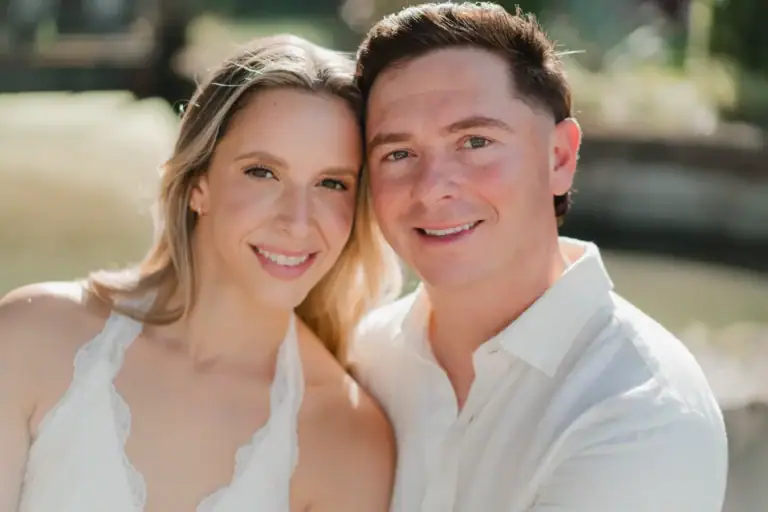 Smiling engagement portrait of Gabby and Mike at Vizcaya Museum and Gardens in Miami