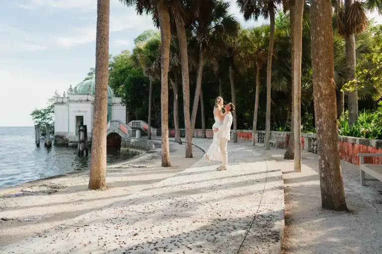 Waterfront couple portrait of Gabby and Mike during their Vizcaya engagement session