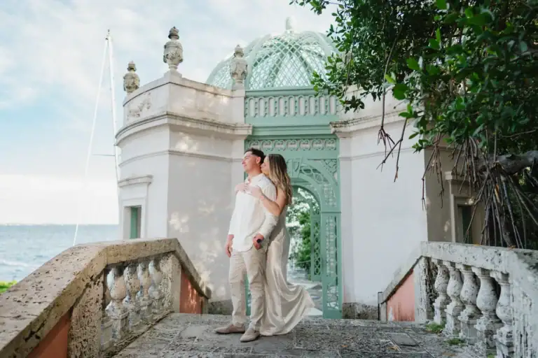 Architectural stairs portrait of Gabby and Mike near the waterfront at Vizcaya Museum and Gardens