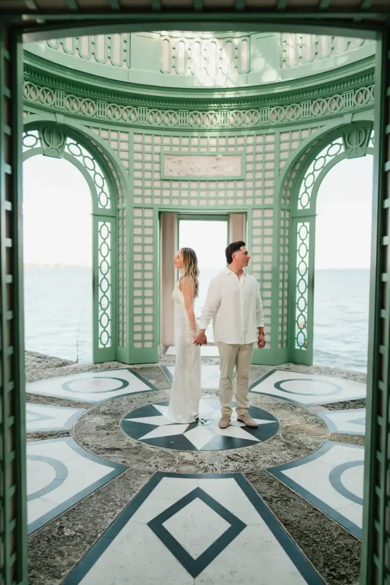 Vertical wide portrait of Gabby and Mike at the Tea House during their Vizcaya engagement session