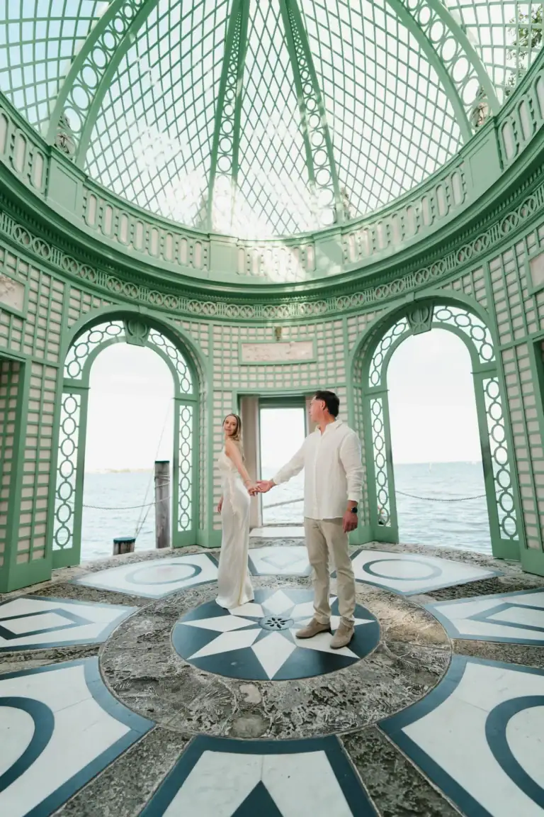Gabby and Mike inside the iconic Tea House dome during their Vizcaya Gardens engagement session in Miami